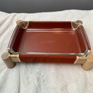 Vintage Pyrex “baker in a hammock” dish and stand